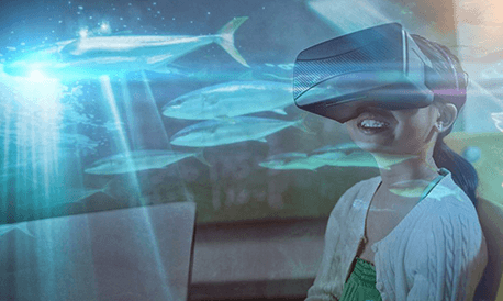 Virtual Reality 2 VR systems that include transmission of vibrations and other sensations to the user through a game controller or other devices are known as haptic systems. This tactile information is generally known as force feedback in medical, video gaming and military training applications. Virtual reality also refers to remote communication environments which provide a virtual presence of users with through telepresence and tele-existence or the use of a virtual artifact (VA). The immersive environment can be similar to the real world in order to create a lifelike experience grounded in reality or sci-fi. Augmented reality systems may also be considered a form of VR that layers virtual information over a live camera feed into a headset or through a smartphone or tablet device.